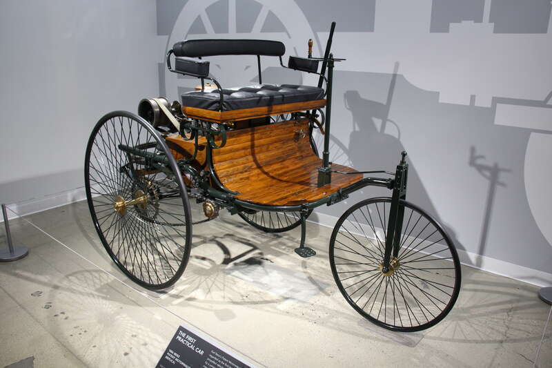 Karl Benz's Patent Motorwagen is regarded as the first practical self propelled vehicle. Powered by a 4 stroke internal combustion engine and had 3 spoke wheels on rubber tyres. though primitive by todays standards, the two passenger Motorwagen