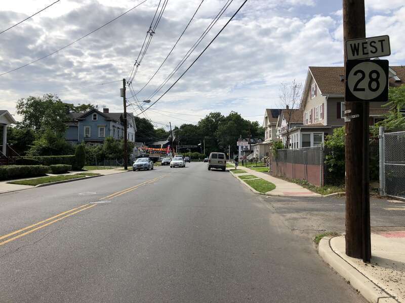 View west along New Jersey State Route 28 (Plainfield Avenue) at Second Street in Plainfield, Union County, New Jersey