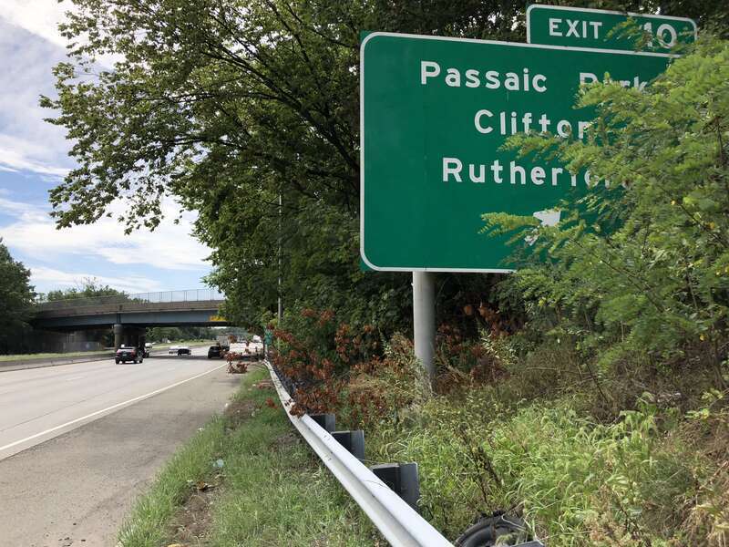 View south along New Jersey State Route 21 (McCarter Highway) at Exit 10 (Passaic Park, Clifton, Rutherford) in Passaic, Passaic County, New Jersey