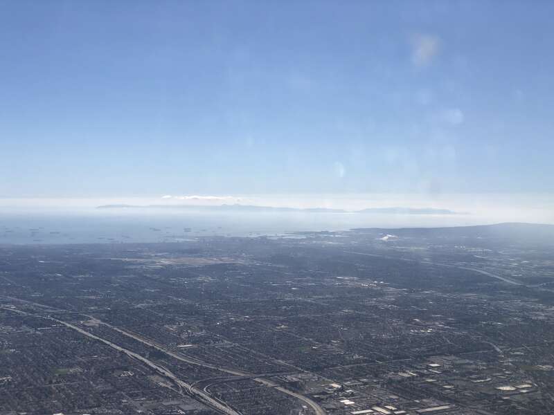 View southwest towards San Pedro Bay and the Port of Long Beach in southern Los Angeles County, California from an airplane heading toward Los Angeles International Airport