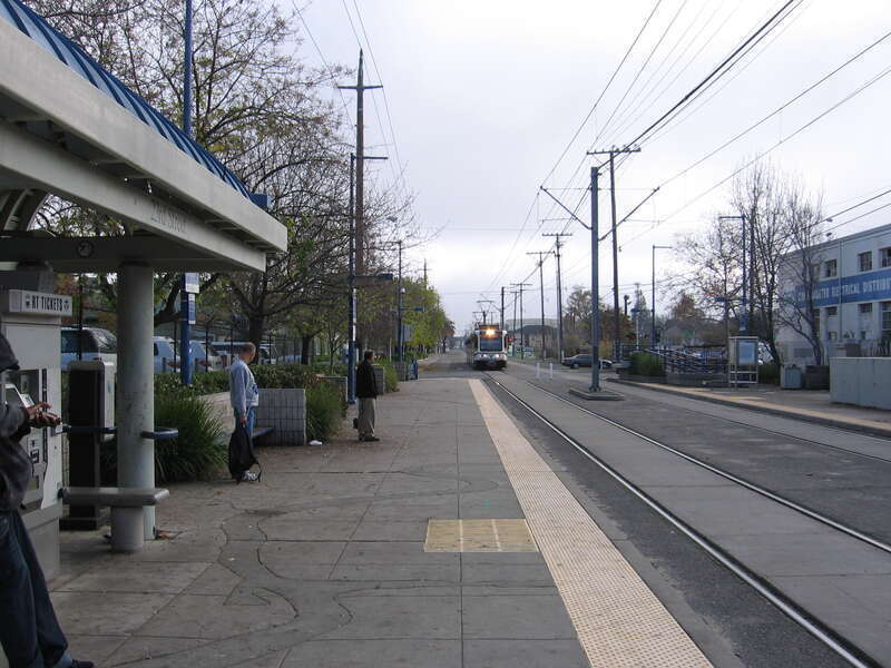 The 23rd Street (Sacramento RT) light rail station in Sacramento, California, USA.  Inbound tram approaches the station.