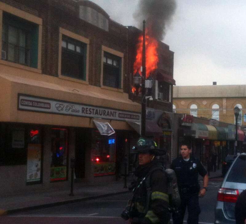 A fire at 4114 Bergenline Avenue in Union City, New Jersey on August 15, 2012. The fire started a short time before 12:45pm, when police officers first arrived on the scene, which was when I was passing by in a commuter van, and first saw what was