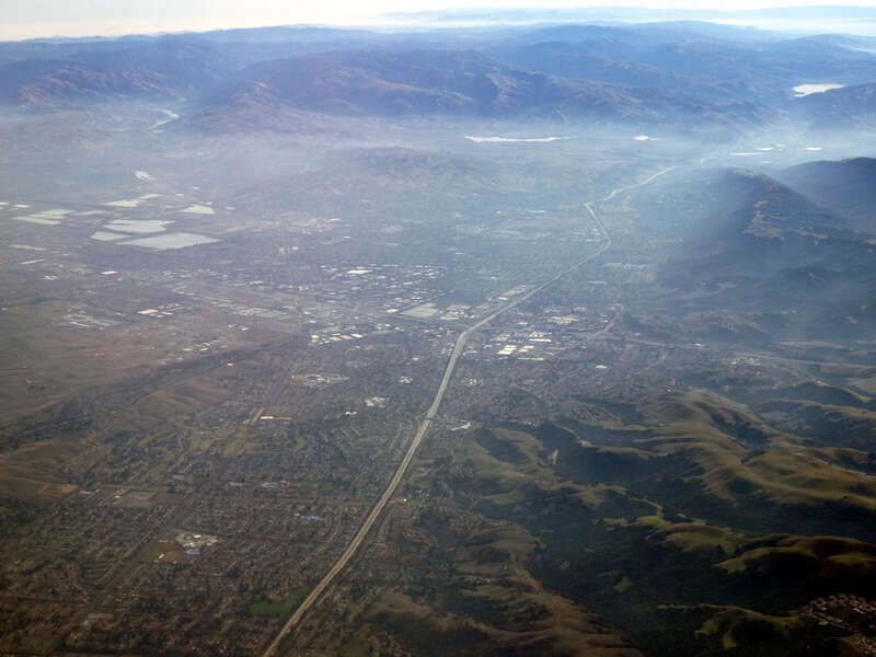 Aerial view of Dublin and Pleasanton with morning fog in December 2023