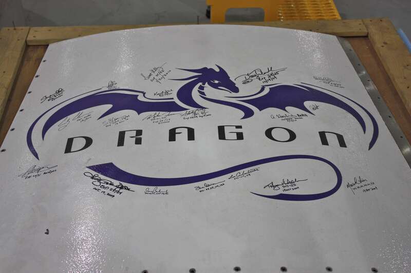 Astronauts training to fly the Dragon capsule sign here.