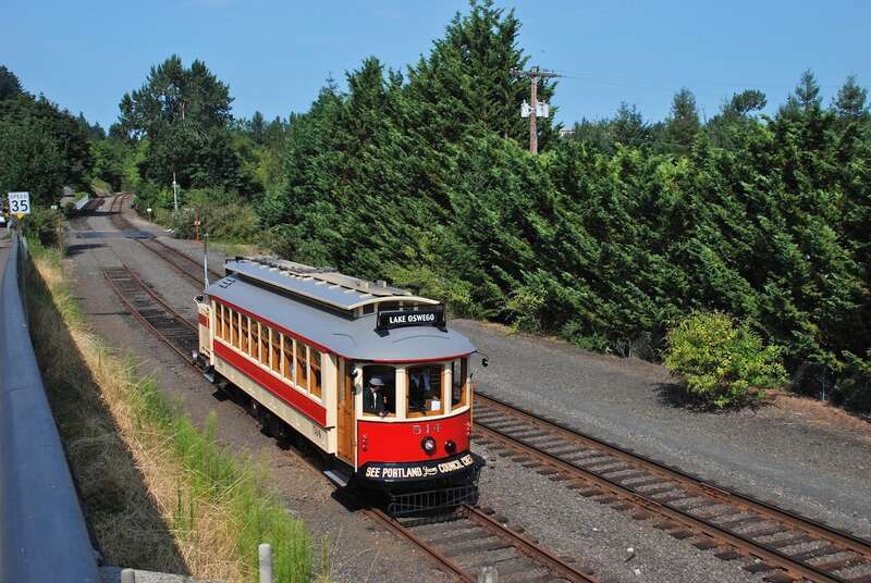 Willamette Shore Trolley car No. 514 approaching downtown Lake Oswego on August 16, 2014, the first day of service for this type of streetcar on the Willamette Shore line. Car 514 is a 1991-built replica of a Portland &quot;Council Crest&quot; car, a model of