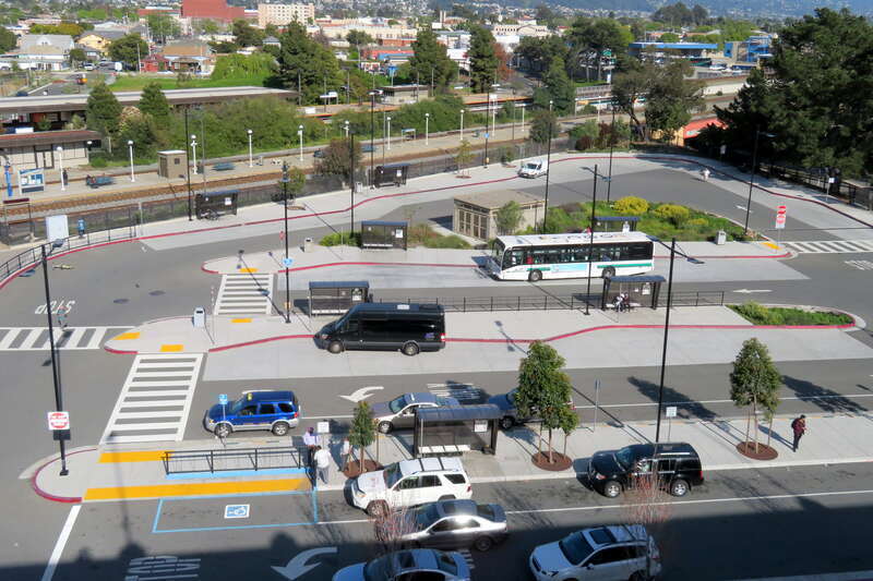 Bus bays and drop-off area at Richmond station in April 2018