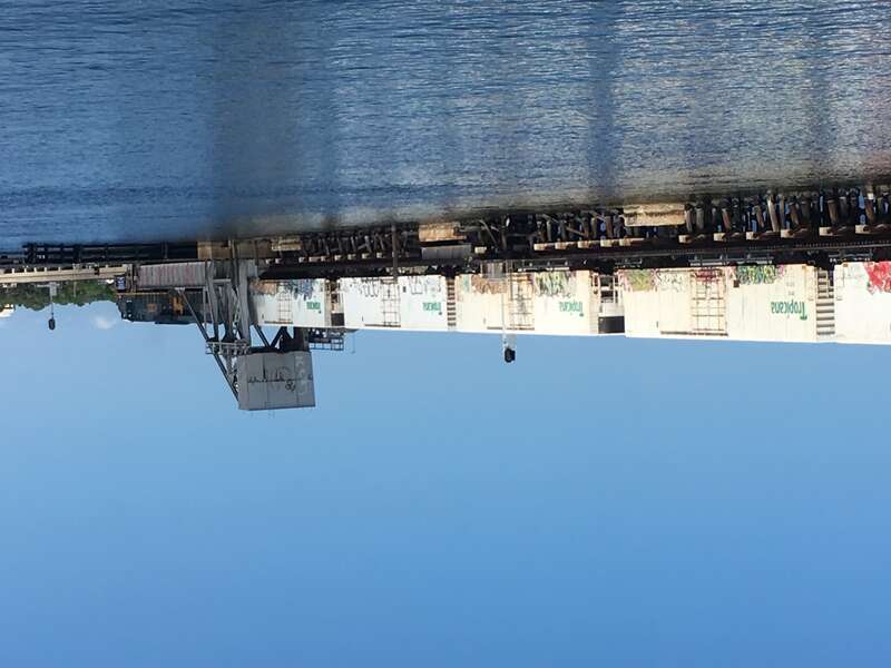 CSX pulling the Tropicana Juice Train across the Manatee River Bridge in Bradenton, Florida.