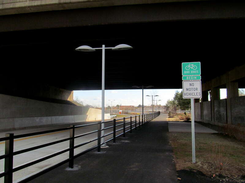 The CTfastrak busway and multi-use path under the Harry Truman Overpass, which carries CT Route 71, just east of the Downtown New Britain station in December 2014