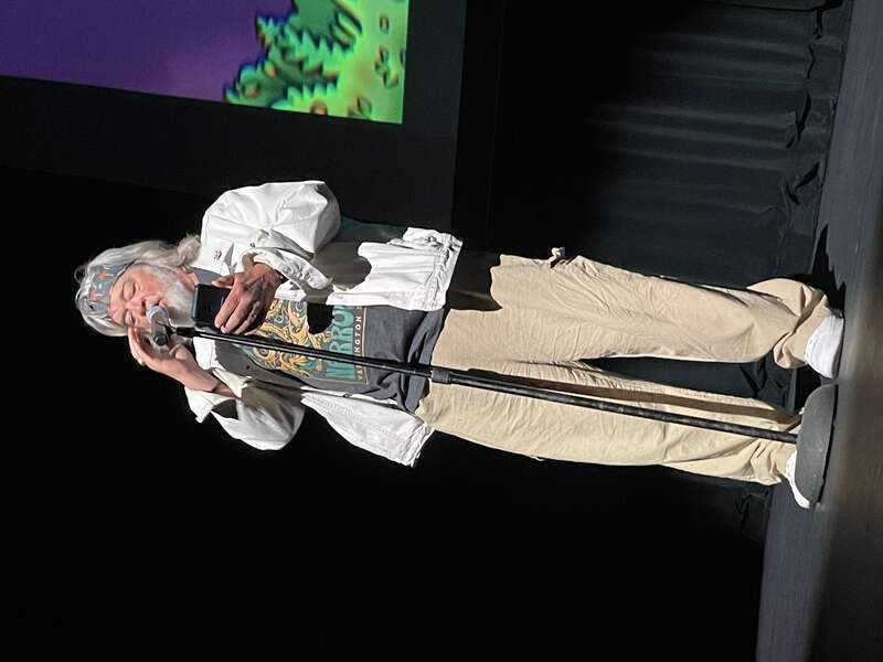 Clint McElroy speaking at a w:My Brother, My Brother, and Me show at the w:Pantages in Tacoma