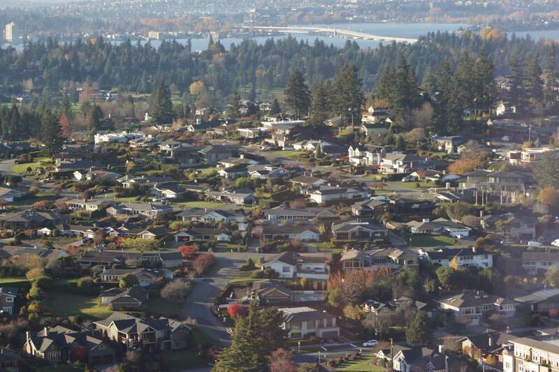 The Clyde Hill neighborhood of Bellevue, as seen from Lincoln Square in downtown Bellevue, Washington. The Evergreen Point Floating Bridge can be seen in the background.