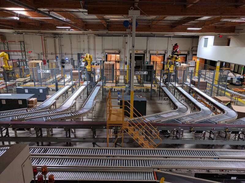 Conveyor belts at the Jelly Belly factory used to move boxes.