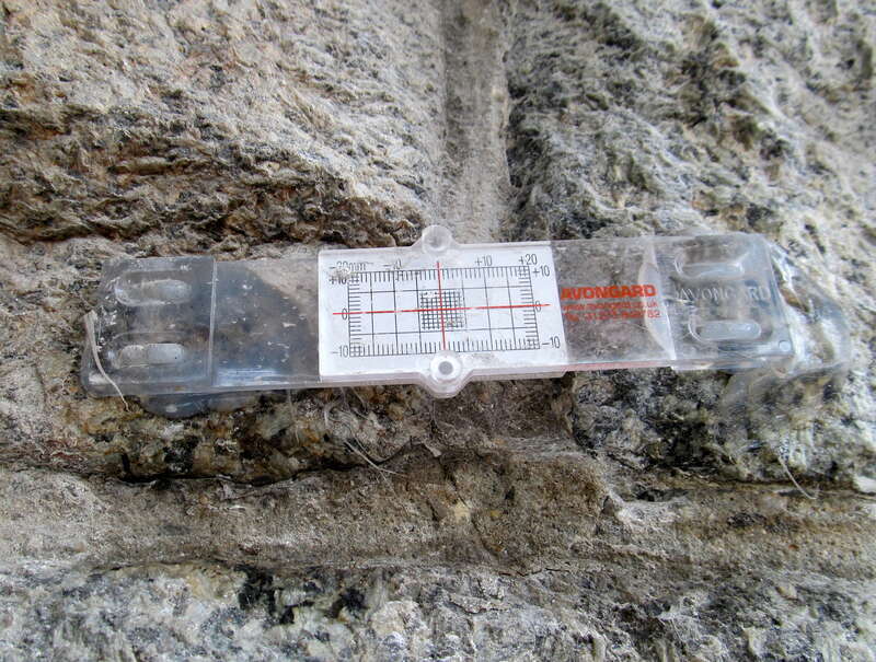 A crack monitor on the north abutment of the Washington Street bridge during Merrimack River Bridge rehabilitation in May 2017