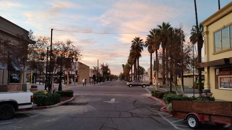 Sunrise over Downtown Hemet, looking south down Harvard St.