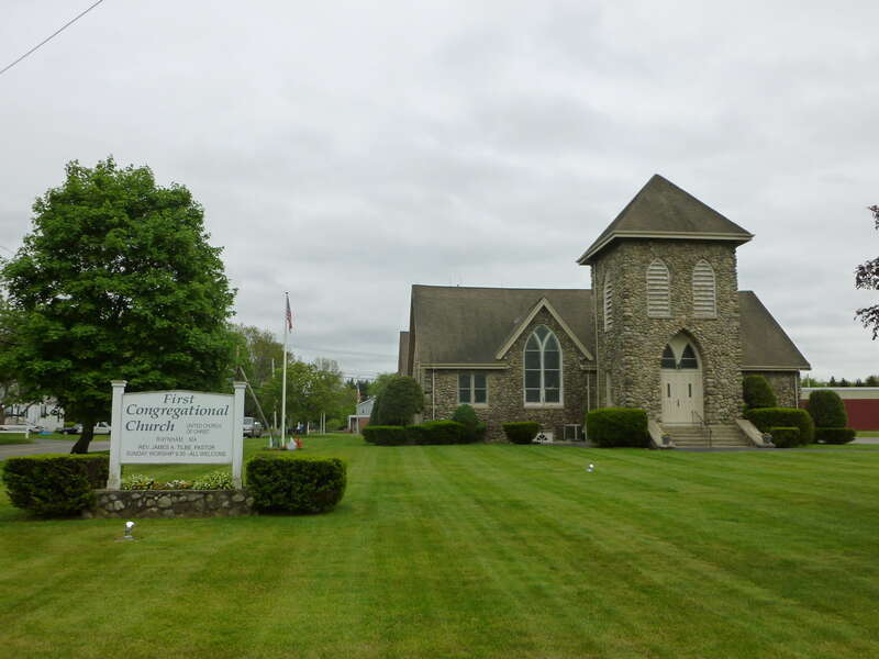 First Congregational Church, located at 785 South Main Street Raynham, Massachusetts 02767.  Church sign and northwest (front) side of building shown.