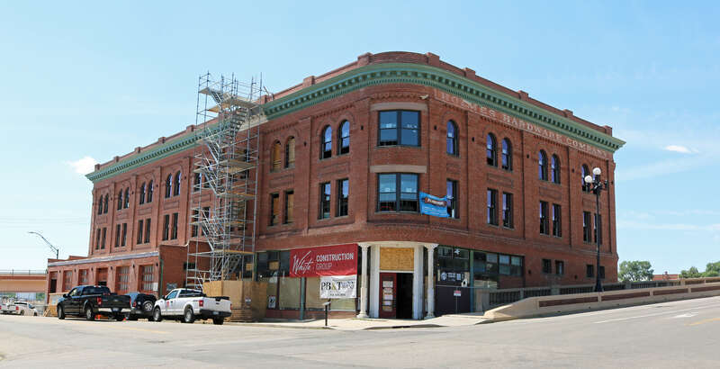 The Holmes Hardware Building, located at 400 South Union Avenue in Pueblo, Colorado. The building is a contributing property in the Union Avenue Historic Commercial District. When this photograph was taken, the building was being renovated and