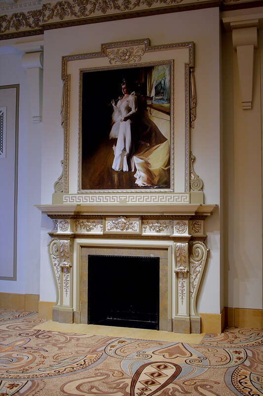 The Fireplace in the Honoré Room in the Palmer House Hilton, Chicago...

sitting atop the mantle of the fireplace is a painting of Bertha "Honoré" Palmer