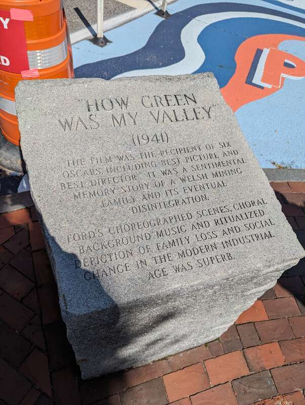 Stone inscription for &quot;How Green Was My Valley&quot; (1941) at John Ford's statue in Portland, Maine