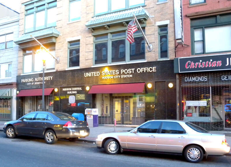 Looking east at en:Hudson City, New Jersey station of Jersey City Post Office at dusk of a sunny day.