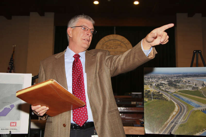 David Thomas (center), with the U.S. Army Corps of Engineers Sacramento District and director of the Folsom Dam Joint Federal Project, addresses the crowd during an Industry Day event June 7, 2012, at Folsom City Hall in Folsom, Calif. The Sacramento