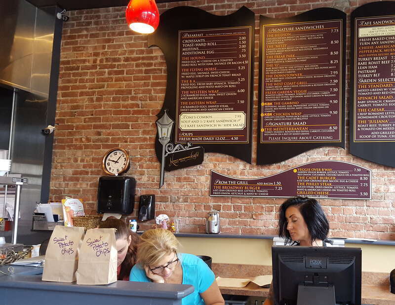 The Capital District Tourism Gnome visits Koni's Broadway Kafe on Broadway between 4th and 3rd streets in Downtown Troy, Rensselaer County, New York. Wonderful food and smiling faces.