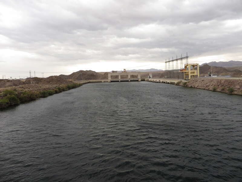 Davis Dam is a dam on the Colorado River about 70 miles (110 km) downstream from Hoover Dam. It stretches across the border between Arizona and Nevada. Originally called Bullhead Dam, Davis Dam was renamed after Arthur Powell Davis, who was the