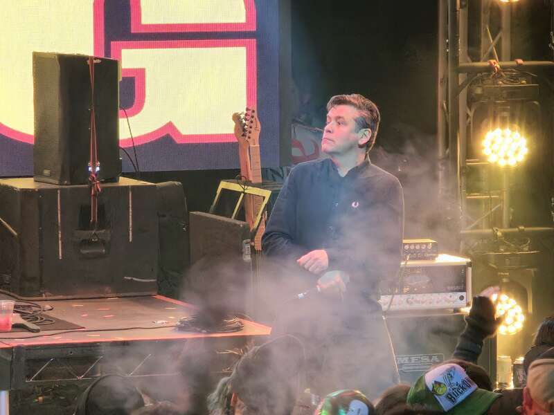 Lead Singer of Mustard Plug gets ready to sing a song