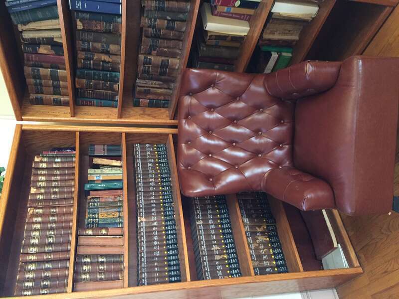 The library in the Karpeles Manuscript Library Museum in Jacksonville is situated in the corner of the main museum space, nestled in close to the stained glass windows. The books are mostly medical and religious nature, reflecting their original