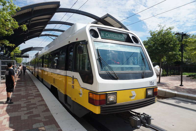 A DART Light Rail Green Line train at MLK Jr. Station in the South Dallas neighborhood in Dallas, Texas (United States).
