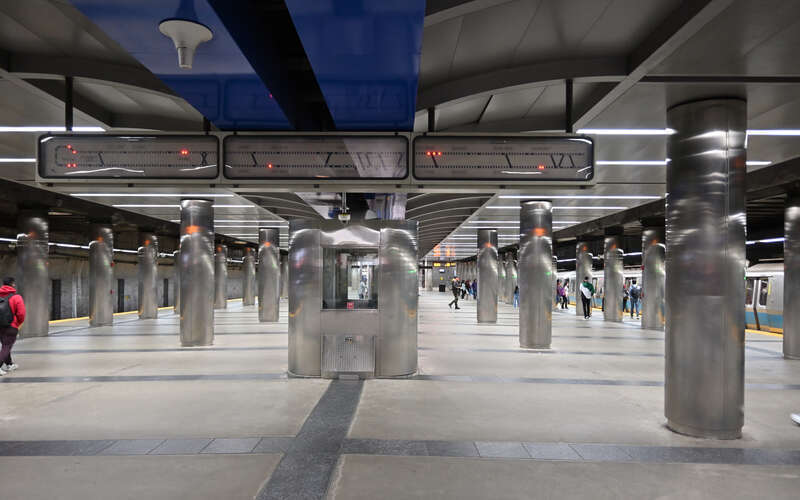The platform at Maverick Station, including the track map display that shows the positions of Blue Line trains
