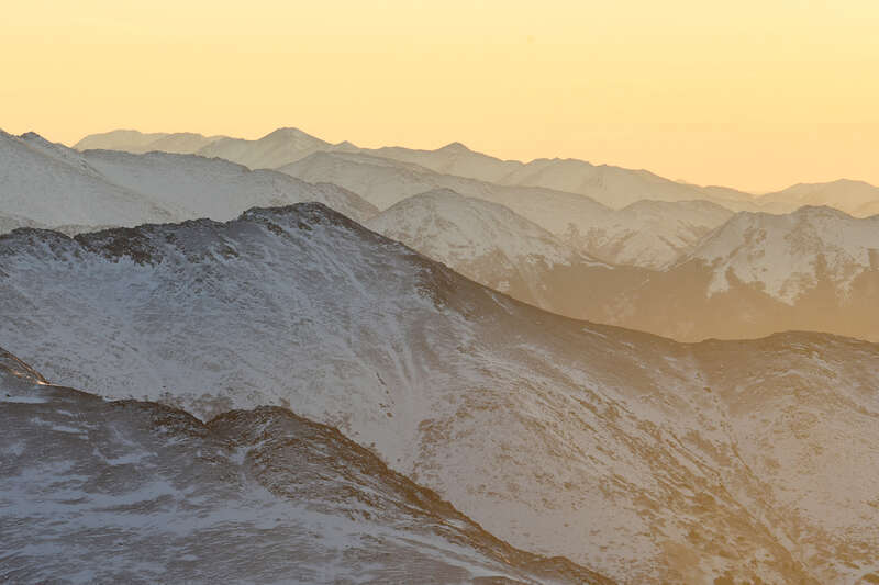 500px provided description: McHugh Peak and the Kenai Mountains, as photographed from the summit of Flattop, in Alaska's Chugach State Park. [#sunset ,#mountains ,#mountain range ,#mountain ranges ,#yellow sunset ,#mountains in distance ,#Alaska
