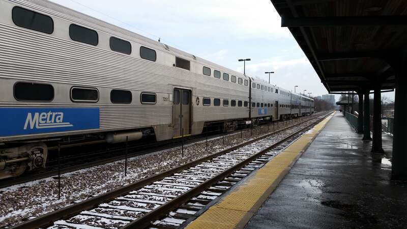 Metra gallery cars on a Chicago-bound service at Evanston Central Street station.
