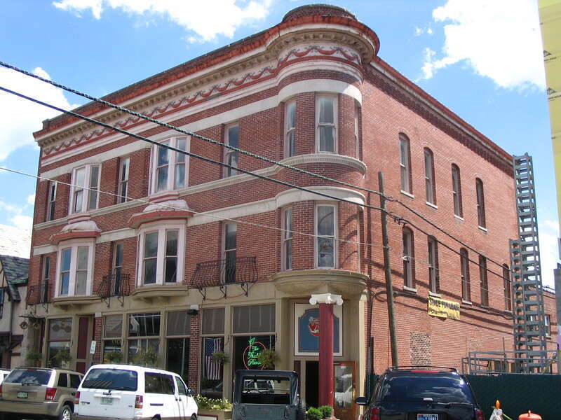 The Historic Francis T. Roots Bldg (1890) located at 115-119 E. Charles Street in Muncie, Indiana.