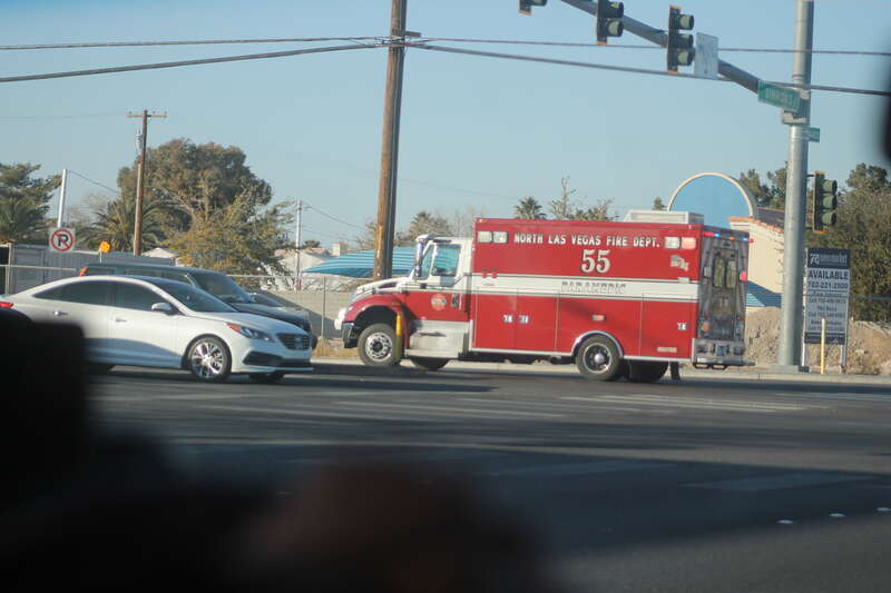 Rescue 55 of the North Las Vegas Fire Department rolling Code 3 at west Craig Road and Simmons Street.