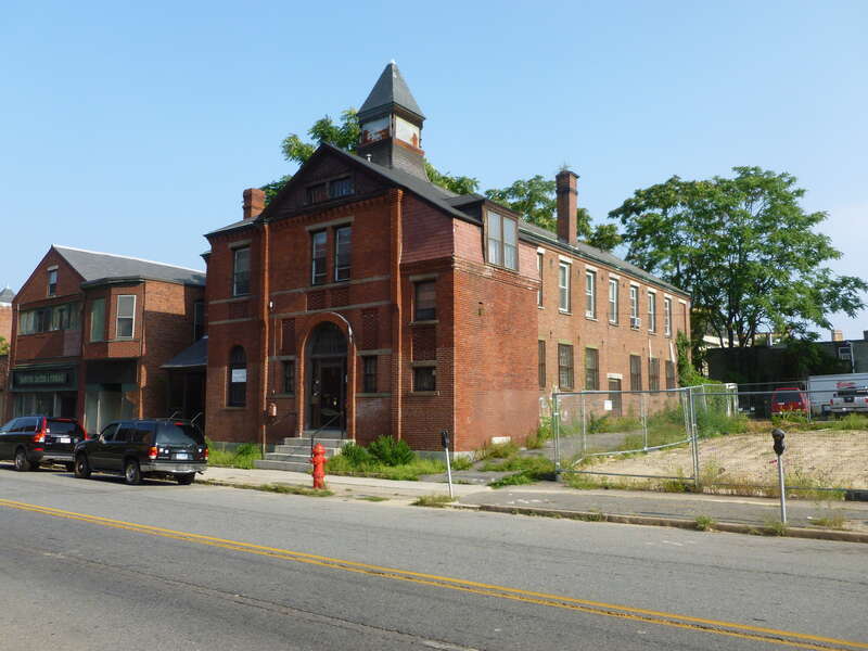 New Life Christian Community Church (and Iglesia de Dios Pentecostal M.I.), located at 150 Middlesex Street, Lowell, Massachusetts.  North and west (front) sides of building shown.