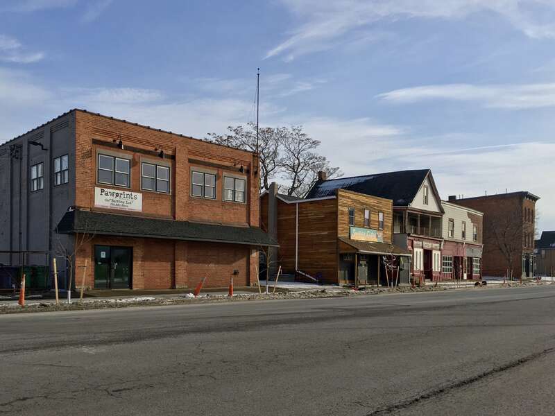 Buildings on the east side of Niagara Street between Auburn Avenue and Breckenridge Street, built between c. 1868 (1239 Niagara, second from left in this photo) and c. 1910 (1245 Niagara, furthest left) and now part of the Upper Black Rock Local