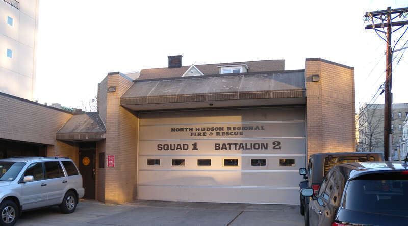Looking west from 50th St and Broadway at a North Hudson Regional Fire and Rescue station on a sunny late afternoon.