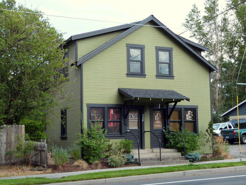 The historic duplex (built 1916), located at 328 Northwest Bond Street in Bend, Oregon, United States, is listed as a contributing resource in the Old Town Historic District. The historic district is listed on the US National Register of Historic