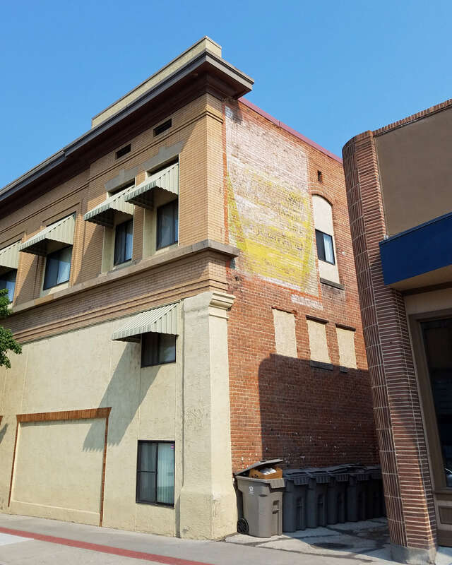 What appear to be a few ghost signs for Oshkosh B'Gosh overalls are evident on the side of the Nampa Department Store (1910), a building designed by Tourtellotte and Hummel and listed on the National Register of Historic Places.