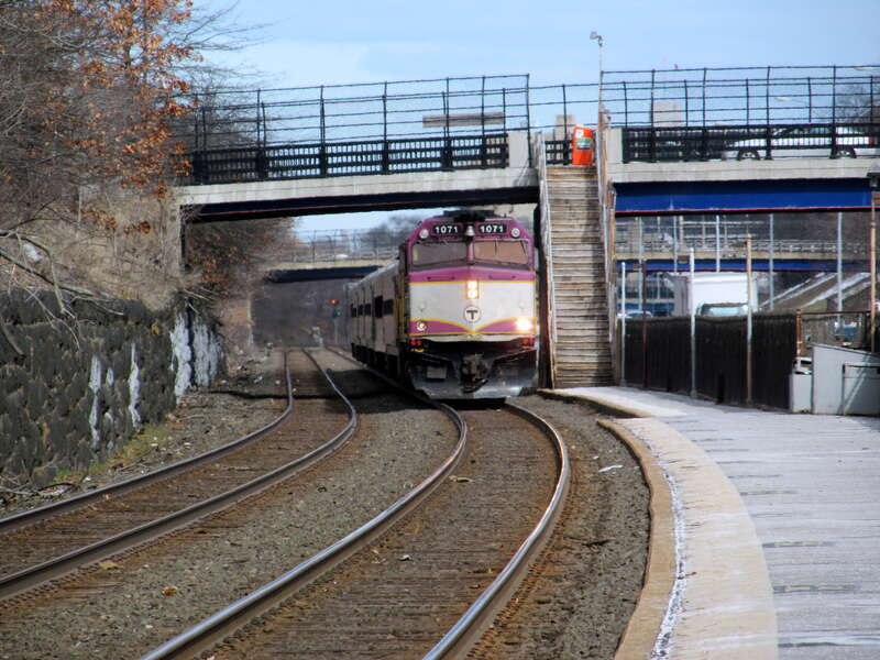 Outbound train arriving at Newtonville station in March 2013