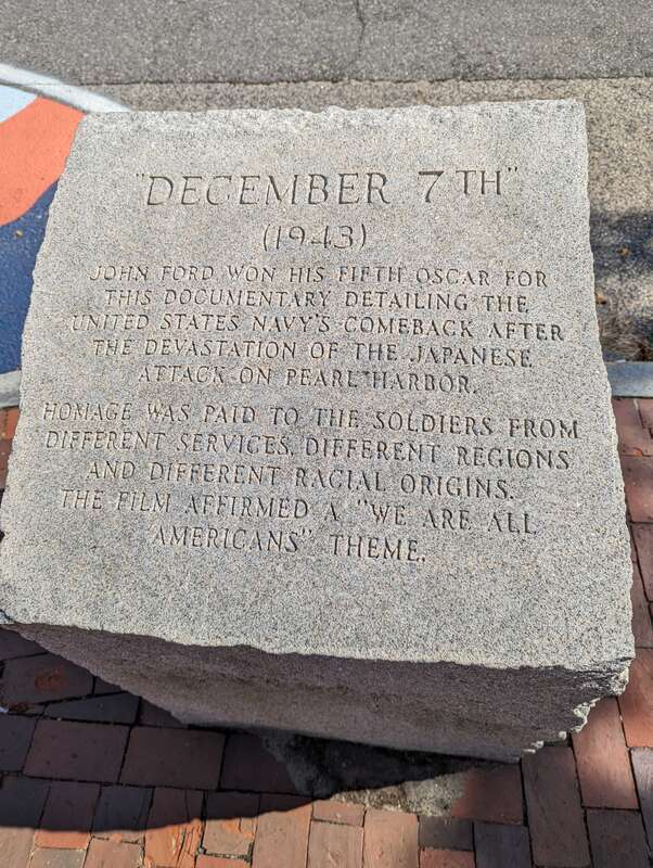 Stone inscription for &quot;December 7th&quot; (1943) at John Ford's statue in Portland, Maine