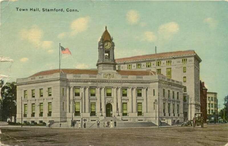 Postcard picture of Town Hall in the Downtown Stamford section of Stamford; store Web page states: &quot;Stamford CT c1914 Postcard&quot;; the Beaux Arts building looked much the same as of July 2008, the tall building behind it is gone, but the two buildings