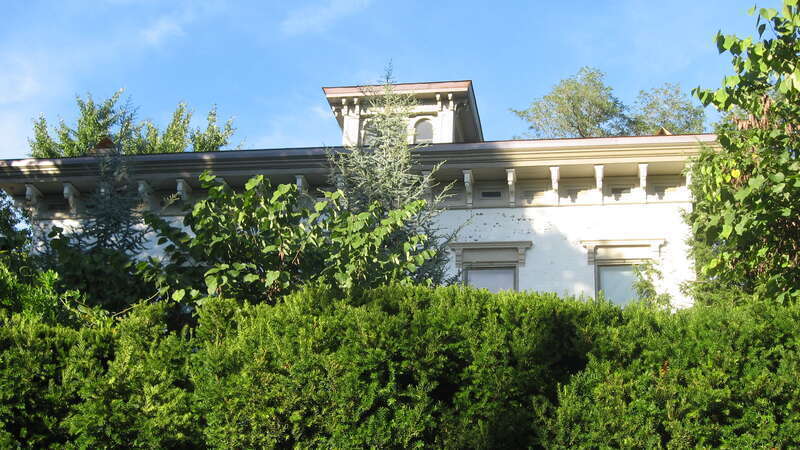 Cornice atop the facade of Rose Hill, located at 1835 Hampden Court in Louisville, Kentucky, United States.  A more comprehensive photo is harder to get, due to extensive shrubbery around the house.  Built in 1852, it is listed on the National