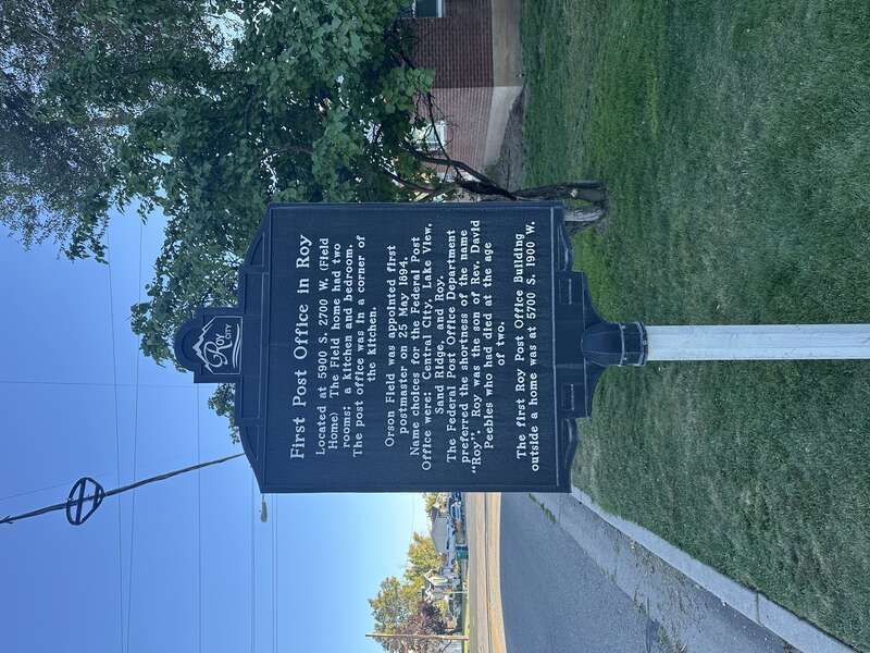 A plaque describing the nature of the first post office in Roy City, Utah.