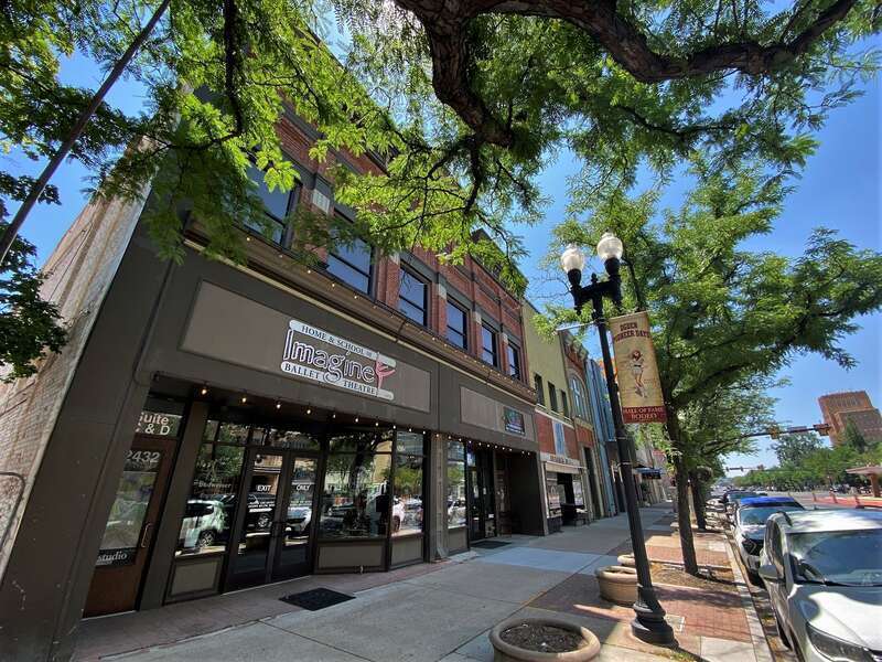 Rushmer Building  View of western facade shows 2436 building at left and 2434 structure (signed Rushmer Building) at right.