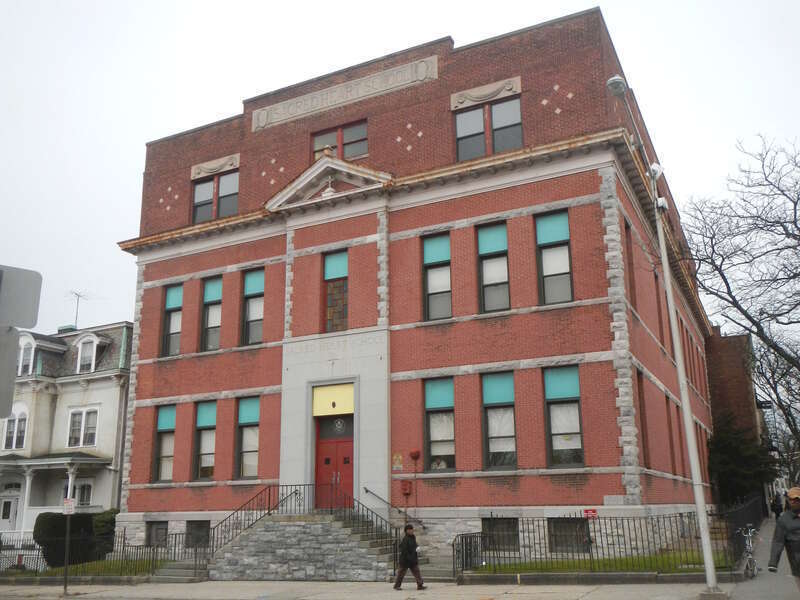 Looking northeast across South 5th Avenue at Sacred Heart School on a gloomy afternoon.