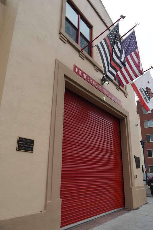 The inscription &quot;Pioneer Hook and Ladder Co&quot; over the door of San Diego's Old Fire Station number 6.