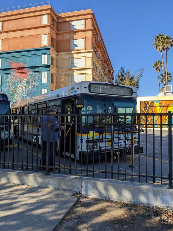The bus parks here, showing expensive refurbishments that a 1998 New Flyer D40LF operated by Santa Cruz metro have. The double bike rack was modified into the racks, and there were route announcements that repeats every 20 seconds. Everything else is