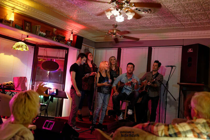 &quot;NAMM Week: Songwriter Series&quot; Songwriters Round at The Ugly Mug Cafe in Orange CA on January 22nd, 2014. Kaela Kinney (tall blonde), Ry Bradley (right), Ryan Terrigno (left), Katelyn Marie (Jack Daniels tshirt), Heidi Howard (dark hair), and Scott