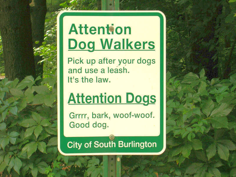 Dog walker warning sign in Red Rocks Park, South Burlington, Vermont, Aug 2006