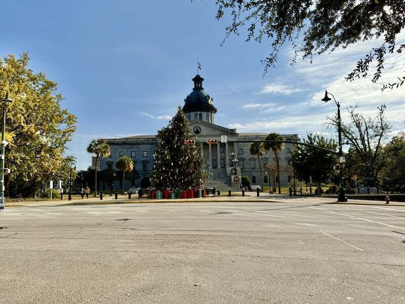 Built in 1851-1907, this Classical Revival-style building was designed by P. H. Hammarskold, John Niernsee, Frank McHenry Niernsee, Frank Pierce Milburn, and Charles Coker Wilson to serve as the state capitol building for South Carolina.  The